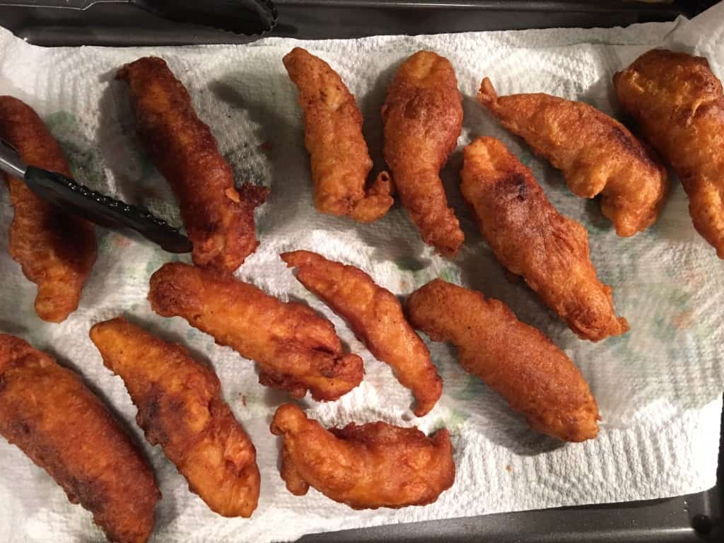 These crispy, crunchy chicken tenders are the BEST. They are deep fried and beer battered and best served with your favorite dipping sauce. 