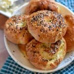 Homemade soft bagels topped with everything seasoning.