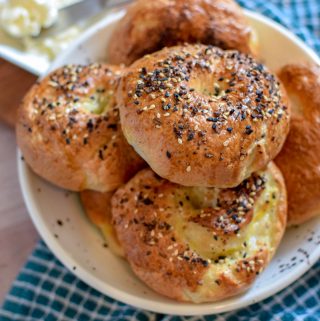 Homemade soft bagels topped with everything seasoning.