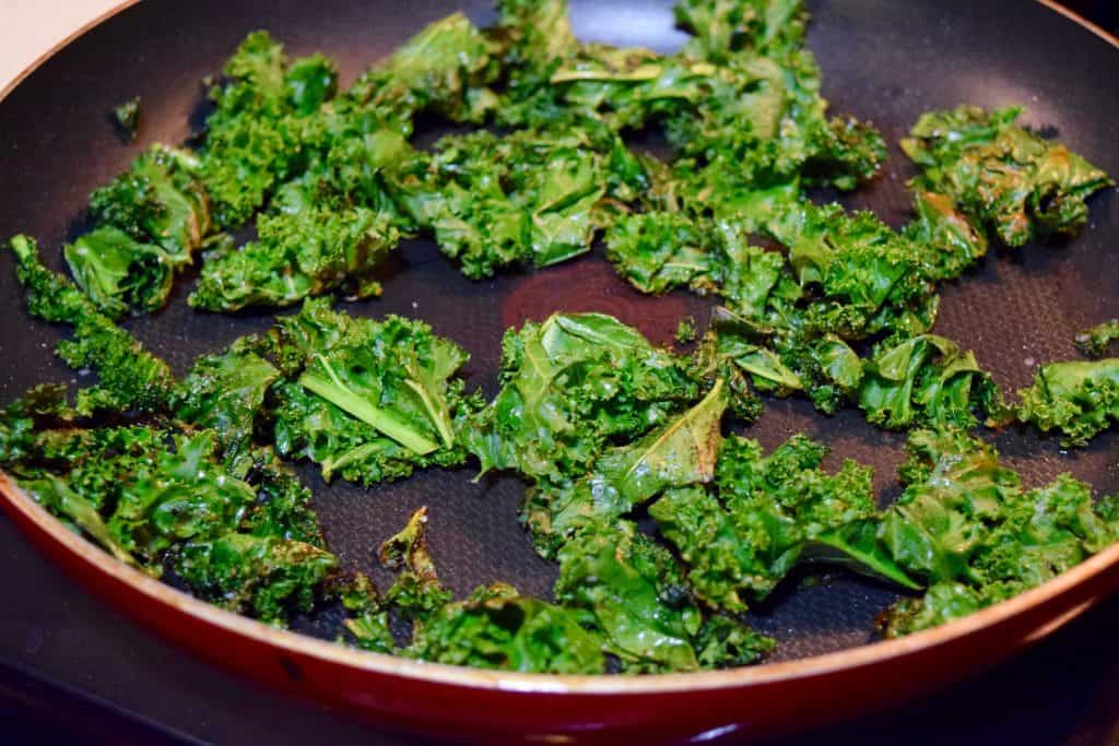 crispy kale being fried.
