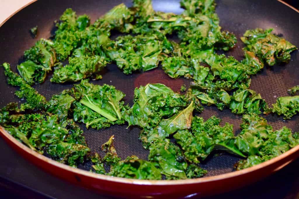 crispy kale being fried.
