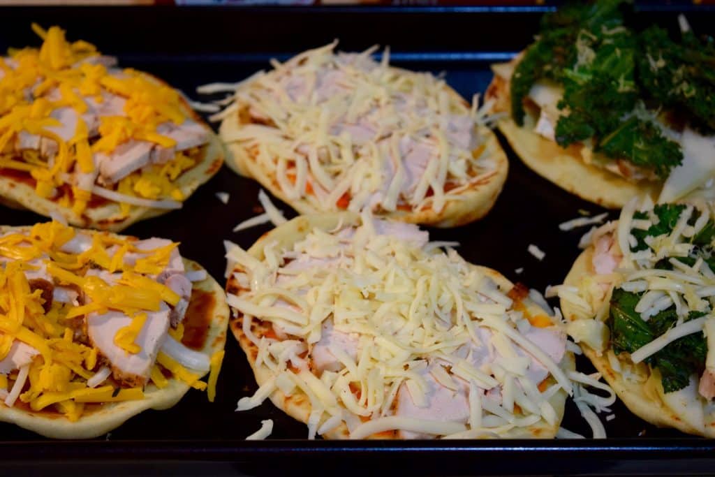 turkey naan flatbreads ready to go in the oven.