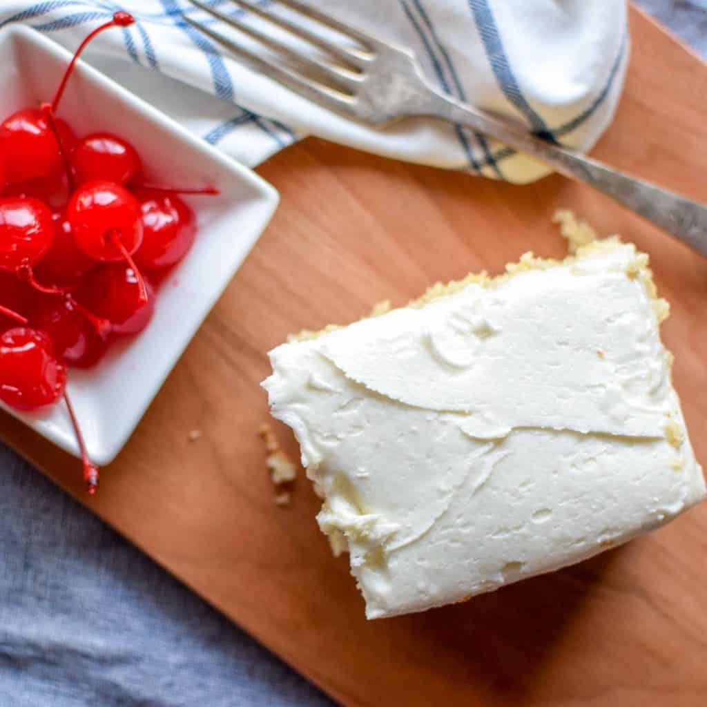 This fluffy white cake recipe will please all cake lovers! Add some freshly made cherry buttercream icing on top for a delightful finish. It's really the cherry on top! 