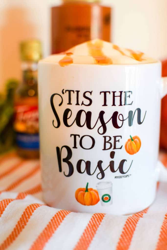 Pumpkin latte in a fall themed mug.