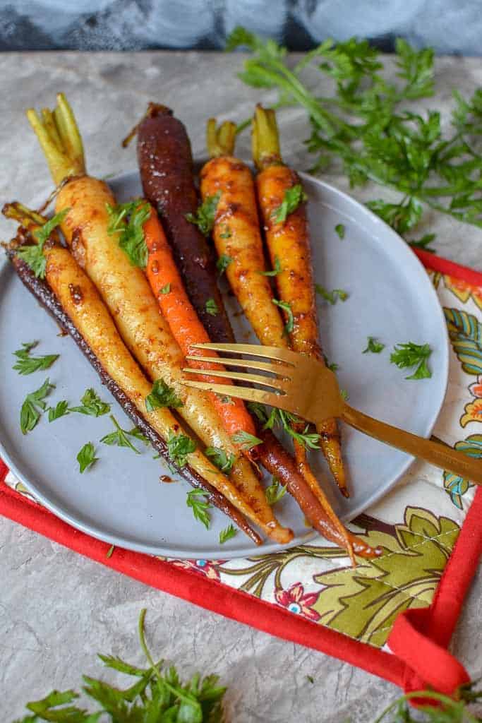 These harissa honey glazed carrots are delightfully easy to make and will make your holiday platter very instagrammable. 