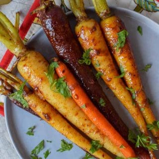 These harissa honey glazed carrots are delightfully easy to make and will make your holiday platter very instagrammable.