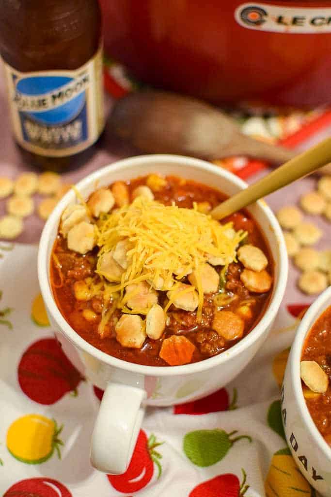 Homemade no bean chili topped with oyster crackers and shredded cheese.