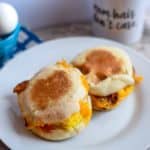 Homemade turkey bacon, egg, and cheese make ahead freezer friendly english muffin breakfast sandwiches.