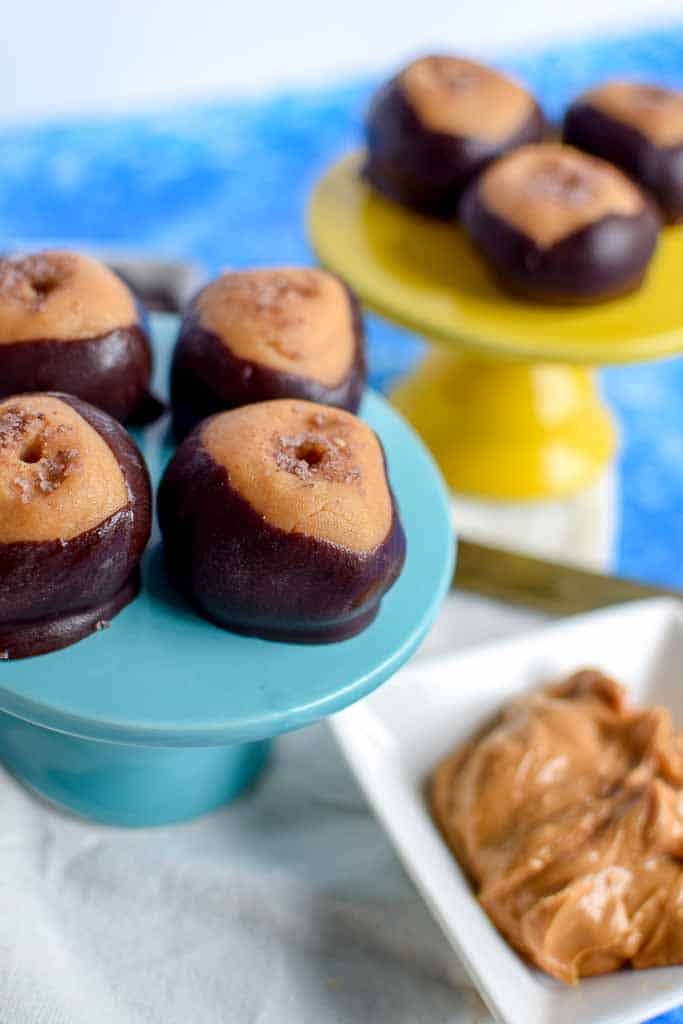 These peanut butter and chocolate candies aka buckeyes are even more delicious with a secret ingredient... coffee! Buckeyes make a wonderful gift for friends and family. The buckeye recipe is really easy to make and just has a few ingredients! 