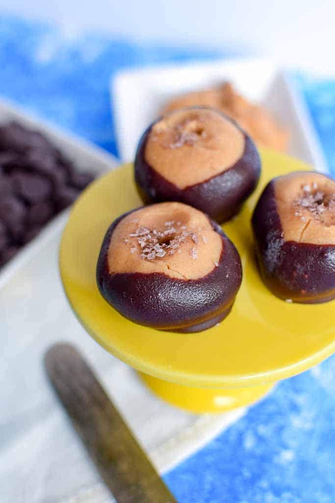 These peanut butter and chocolate candies aka buckeyes are even more delicious with a secret ingredient... coffee! Buckeyes make a wonderful gift for friends and family. The buckeye recipe is really easy to make and just has a few ingredients! 