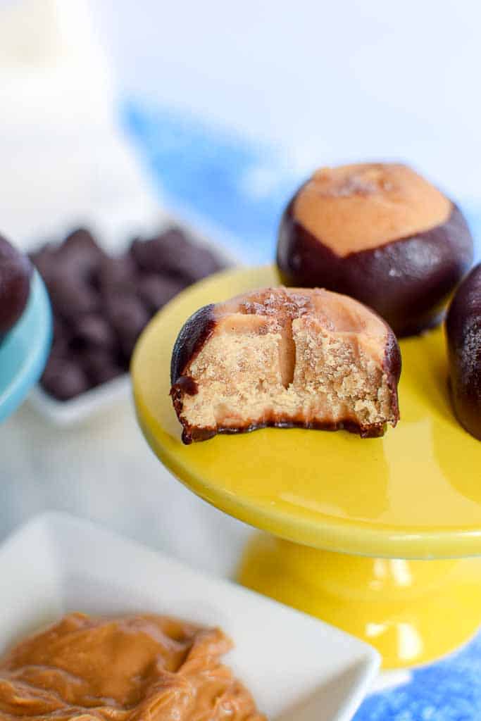 These peanut butter and chocolate candies aka buckeyes are even more delicious with a secret ingredient... coffee! Buckeyes make a wonderful gift for friends and family. The buckeye recipe is really easy to make and just has a few ingredients! 