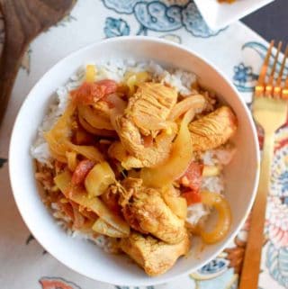This homemade chicken curry has amazing flavor, isn't too spicy and is best served over some white rice.