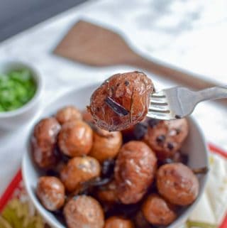 These homemade grilled potatoes are made with lamb bacon and green onions! They are the most delicious side dish for your summer cookout.