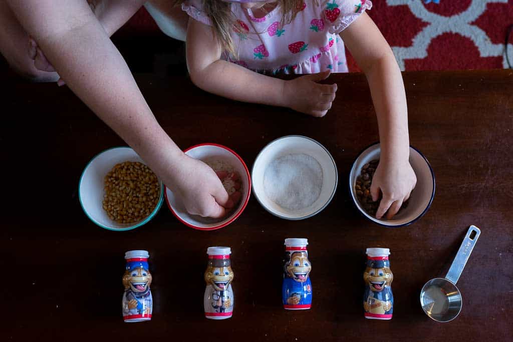 We used Danimals® Organic Drinkable Yogurt to make some homemade DIY maracas! This up-cycled craft is incredibly easy to make and a favorite for all ages. 