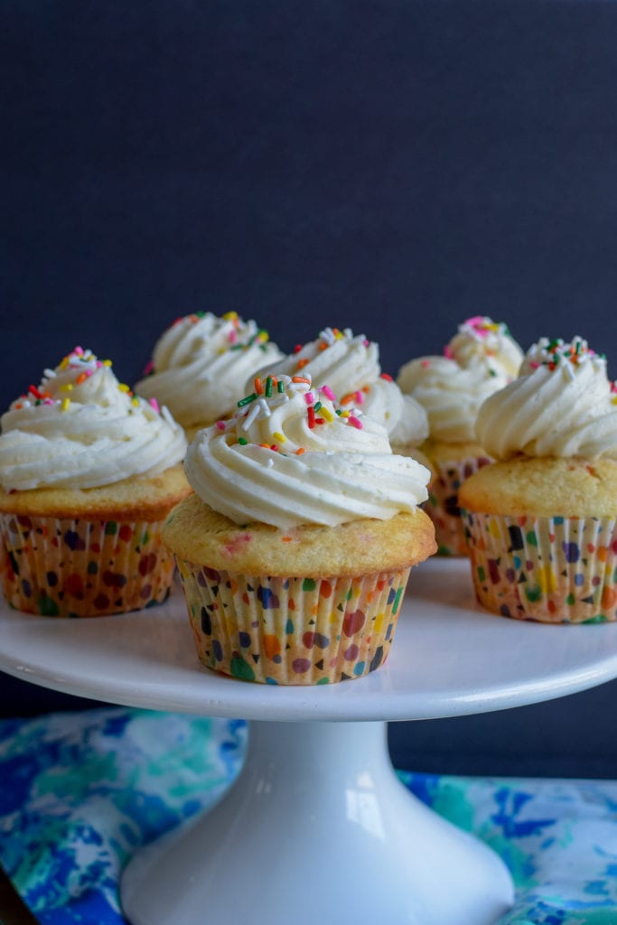 Funfetti cupcakes are the best for a celebration..or a Monday. This funfetti recipe is EXTRA easy because we use a boxed cake mix. Shhh. 