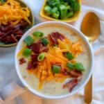 This loaded baked potato soup is delicious and SO easy! It's made in a crock pot, so you can leave it for a few hours and also make your house smell divine.