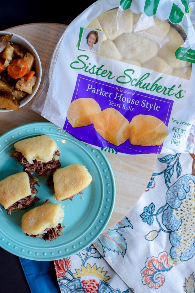 These pot roast sliders are the absolute best! They are made in the crock pot and served on Sister Schubert’sⓇ Parker House Style Yeast Rolls.
