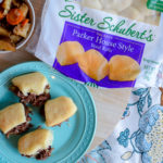 These pot roast sliders are the absolute best! They are made in the crock pot and served on Sister Schubert’sⓇ Parker House Style Yeast Rolls.