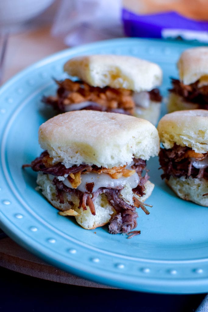 These pot roast sliders are the absolute best! They are made in the crock pot and served on Sister Schubert’sⓇ Parker House Style Yeast Rolls.