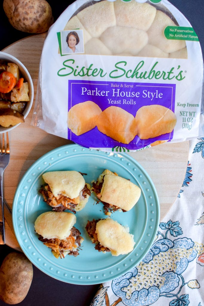 These pot roast sliders are the absolute best! They are made in the crock pot and served on Sister Schubert’sⓇ Parker House Style Yeast Rolls.
