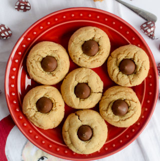 Peanut butter blossoms are a classic and beloved cookie but we made them even better by using a seasonal hot cocoa chocolate kiss in the middle!
