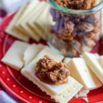 These easy candied pecans are so simple to make and taste delicious on their own or topped on a cheese plate! The recipe can be easily adapted for other crispy candied nuts.