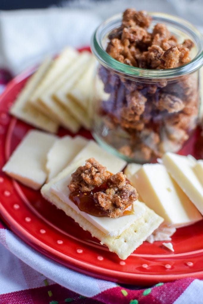 These easy candied pecans are so simple to make and taste delicious on their own or topped on a cheese plate! The recipe can be easily adapted for other crispy candied nuts.