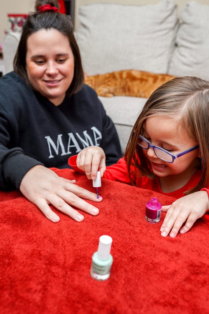 Mother and daughter getting manicures together to celebrate Valentine's day.