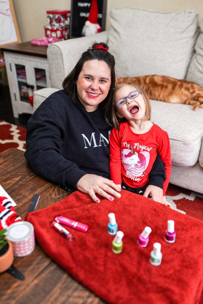 Mother and daughter celebrating valentines day at home.