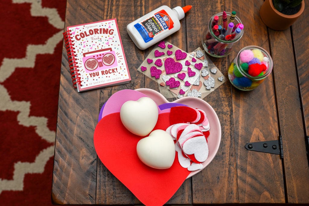 Table full of activities for valentines day.