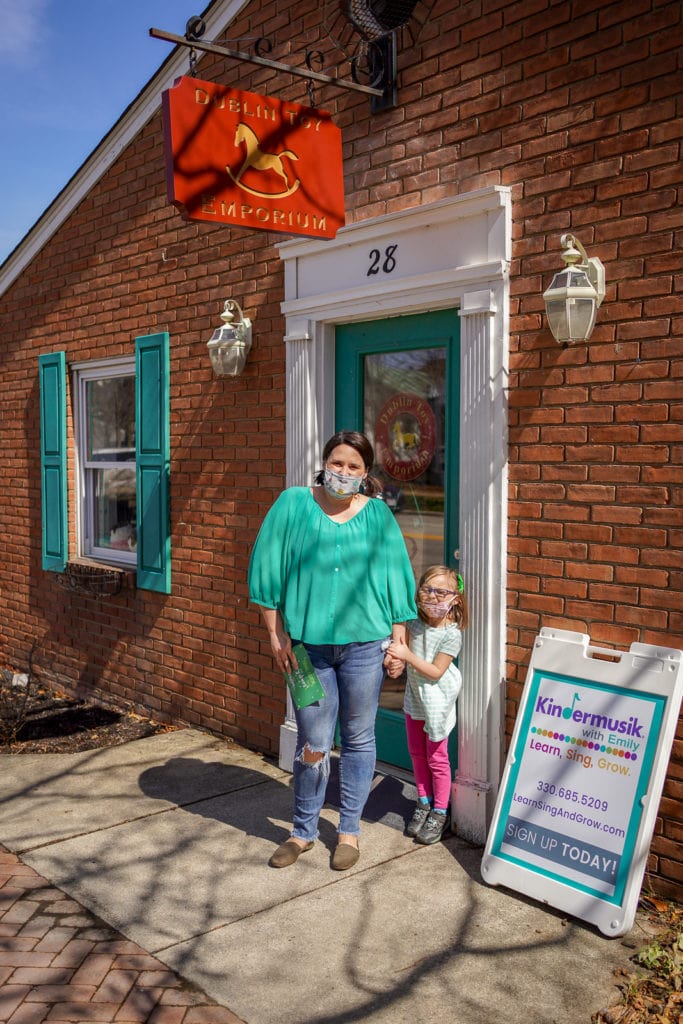 Family outside of toy store in Dublin, Ohio.