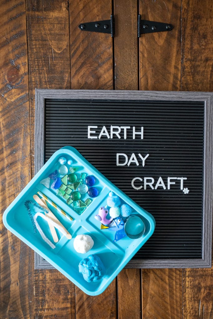 Earth day sign with play-doh craft.