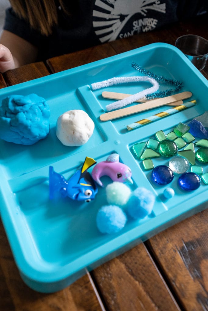 Ocean craft for earth day laid out on a tray.