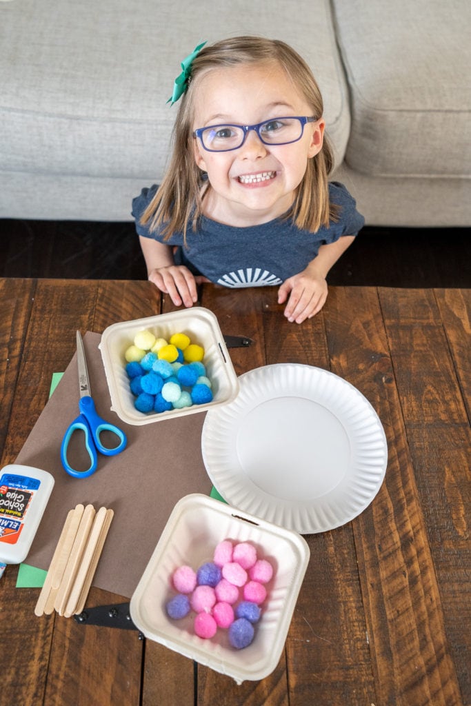 Child exciting about starting a craft.