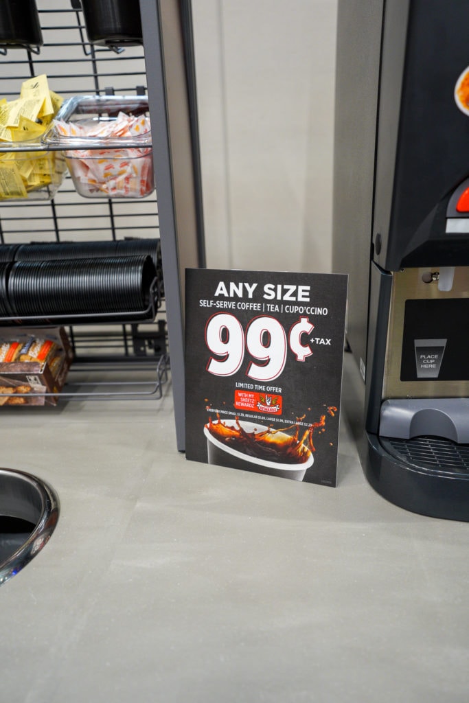 Coffee promo signage inside Sheetz gas station.