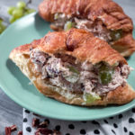 What is better than homemade chicken salad? Homemade chicken salad on a soft croissant! This super easy recipe has a secret ingredient that makes it extra delicious. Plus, it's filled with freshly toasted pecans. YUM!