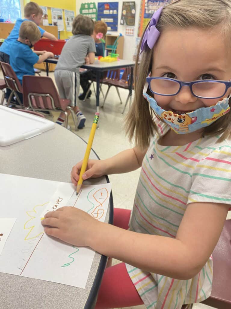 Child drawing at preschool.