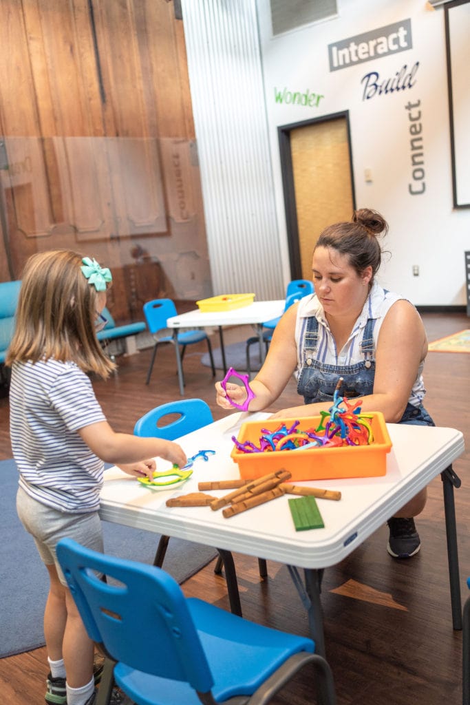 mother and daughter doing building activity at The Works kids museum in Newark, Ohio.