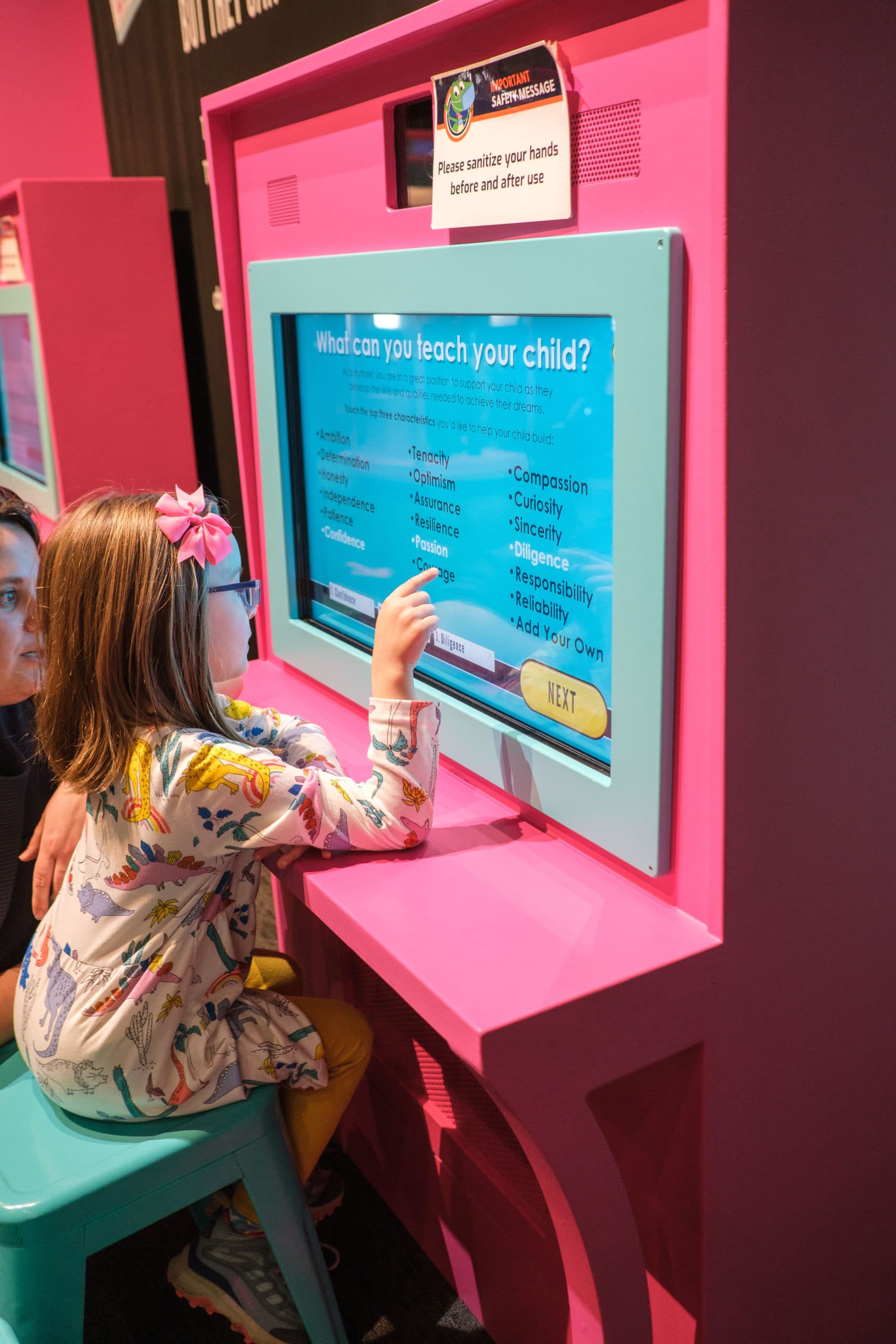 Child using interactive exhibit at the Children's Museum Of Indianapolis.