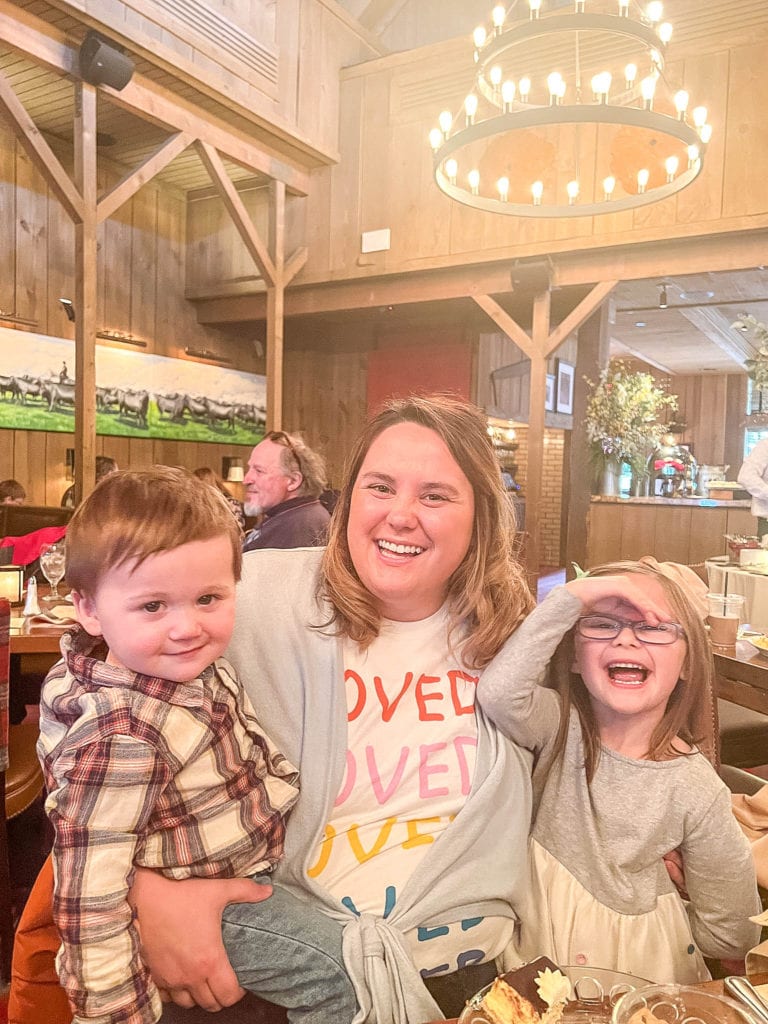 Family posing together during brunch at The Barn at Rocky Fork Creek in Gahanna, Oh.