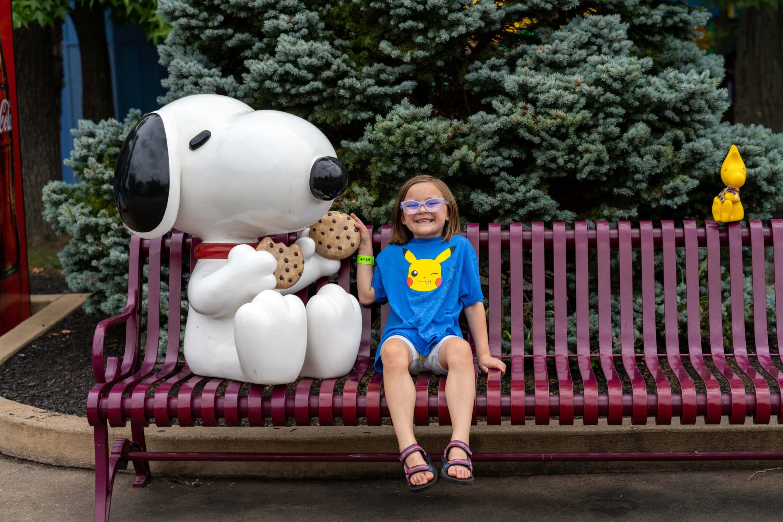 Young girl with Snoopy at Planet Snoopy at Kings Island in Mason, Ohio.