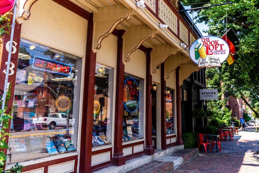 The outside of The Book Loft of German Village with Stauf's Coffee in the background.