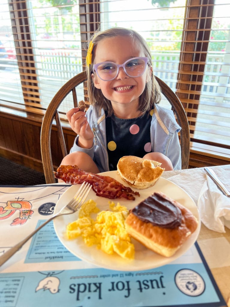 Young girl eating the buffet at Der Dutchman in Plain City Ohio.