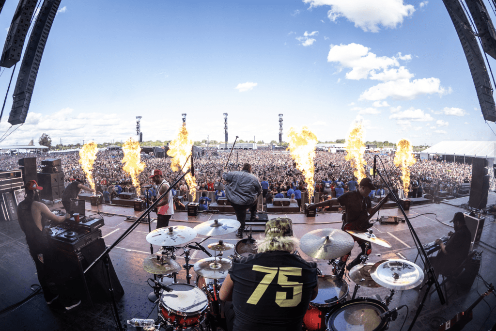 Jellyroll performing in front of a large crowd at the Louder Than Life Music Festival in Louisville, KY.